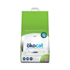 A bag of Ökocat natural cat litter with a bright green top portion and white bottom. The package features the Ökocat logo and appears to show natural wood fiber litter. There are small circular icons on the package indicating product features.