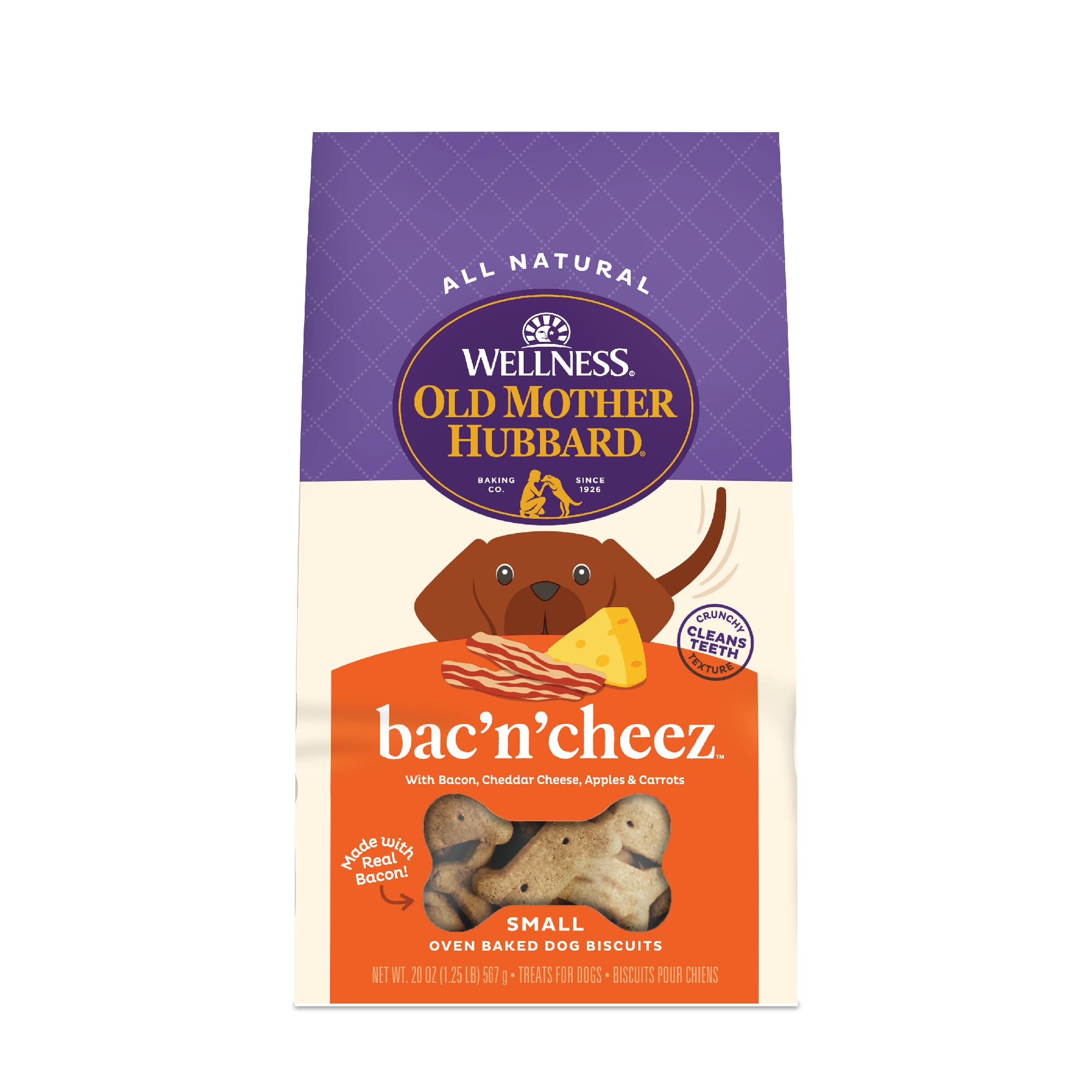 Front of a bag of Wellness Old Mother Hubbard bac’n’cheez small oven-baked dog biscuits. The packaging features a purple and cream design with a cartoon dog peeking over an orange background, next to images of bacon and cheese. The label highlights that the treats are made with real bacon, cheddar cheese, apples, and carrots. The bag also promotes the biscuits as crunchy and helpful for cleaning teeth. Net weight is 20 oz (567 g).
