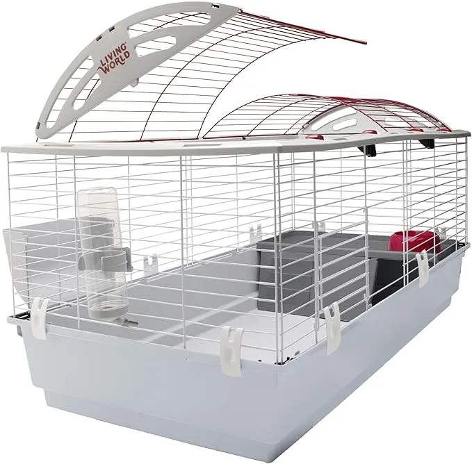 Living World Deluxe guinea pig habitat with white wire cage, gray plastic base, curved roof opening, and attached hay feeder and water bottle